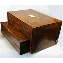 A mid 19th century burr walnut sewing and writing box, the rectangular hinged lid cross banded in k.
