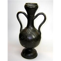 An Art Nouveau style bronze vase, possibly Japanese, the swollen rim of the slender neck cast as a..