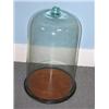 Image 1 : A Victorian glass domed cover with ball handle central to the top, the cylindrical sides flaring sl.