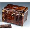 Image 1 : An early Victorian tortoiseshell tea caddy, the rectangular lid with wavy front and back and closin.