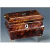 Image 1 : An early Victorian tortoiseshell tea caddy, the sarcophagus shape with veneers separated by white m.