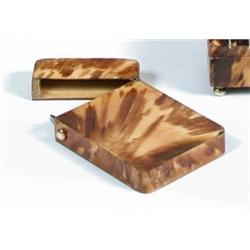 An early 19th century tortoiseshell card case, the top of the rectangular lid bearing a white metal.