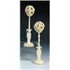 Image 1 : Two Chinese ivory ball within ball carvings, each with floral outer ball, the supporting cups on tu.