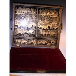 A mid 19th century Chinese gilt black lacquer writing slope, the rectangular fall front lid and sid.