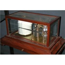 A 20th century Russell of Norwich barograph, the glazed mahogany case containing drum to take the w.