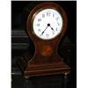 Image 1 : An early 20th century mahogany cased balloon clock, the French eight day movement with platform esc.