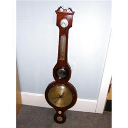 A Vannini, Sheffield, a mahogany case barometer, the swan neck pediment above dry/damp dial, thermo.