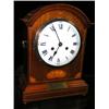 Image 1 : An early 20th century mahogany cased German mantel clock, the eight day movement chiming on two coi.
