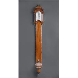 A walnut stick barometer, early 18th century and later restored, the unsigned engraved plates with..