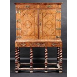 A late 17th century and later walnut chest on stand, the upper section with moulded cornice above t.