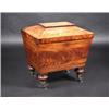 Image 1 : A 19th century mahogany wine cooler, of sarcophagus form with tapering sides, standing on turned fe.