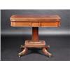 Image 1 : A Regency mahogany card table, the crossbanded rounded rectangular baize lined fold over top above..
