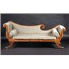 Image 1 : A William IV mahogany framed scroll end settee, the scrolling padded back above padded arms and cus.
