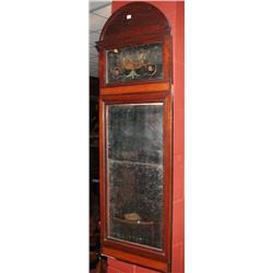 A 19th century mahogany framed wall glass, the arched cornice above a painted rectangular plate abo.