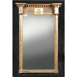 Two 19th century gilt framed wall glasses, each with moulded cornice above a rectangular plate flan.