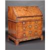 Image 1 : An early 18th century walnut bureau, the feather banded rectangular top above a similarly banded fa.