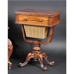A William IV rosewood games / work table, the moulded rectangular chessboard inlaid fold over top a.