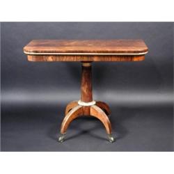 A Regency rosewood card table, the rounded rectangular baize lined fold over top above a plain frie.