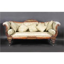 An early 19th century rosewood framed scroll end settee, the acanthus carved brass inlaid arched to.
