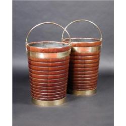 A pair of Irish 18th century mahogany peat buckets, each of ribbed coopered construction with a bra.