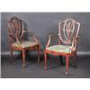 Image 1 : A set of four George III style mahogany dining chairs, including two carvers, each with shield shap.
