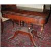 Image 1 : A Regency mahogany pedestal card table, the crossbanded rounded rectangular baize lined fold over t.