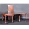 Image 1 : A Regency mahogany extending dining table, the moulded rounded rectangular top incorporating two le.