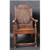 Image 1 : An oak Wainscot chair, the acanthus carved scrolling top rail above a floral carved panel back, dow.