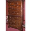 Image 1 : A George III mahogany chest on chest, the associated upper section with moulded dentil cornice abov.
