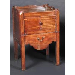 A George III mahogany night table, the square top with solid gallery incorporating pierced handles..