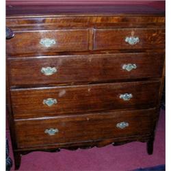An early 19th century oak and mahogany chest, the moulded rectangular top above two short and three.