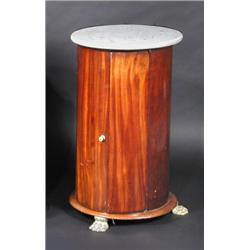 A Victorian mahogany pedestal pot cupboard, the circular marble top above a pair of doors enclosing.