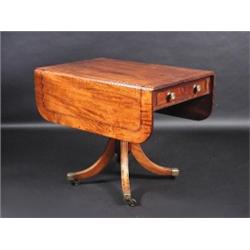 A Regency mahogany pedestal Pembroke table, the moulded rectangular twin flap top with reeded edge..