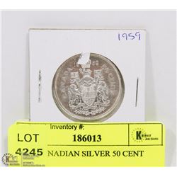 1959 CANADIAN SILVER 50 CENT PIECE.