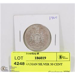 1960 CANADIAN SILVER 50 CENT PIECE.