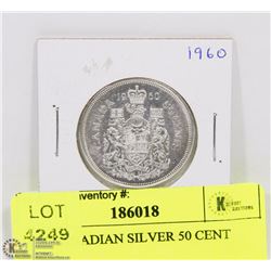 1960 CANADIAN SILVER 50 CENT PIECE.