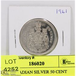 1961 CANADIAN SILVER 50 CENT PIECE.