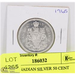 1965 CANADIAN SILVER 50 CENT PIECE.