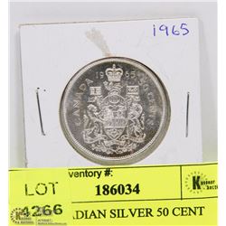 1965 CANADIAN SILVER 50 CENT PIECE.
