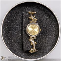 GIAN GIORGIO DOLPHIN BAND GOLD TONE WATCH.