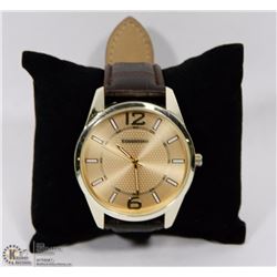 CERENTINO LARGE GOLD TONE WATCH WITH LEATHER