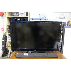 LG LARGE FLATSCREEN TV AND SOUNDBAR - HAS REMOTE