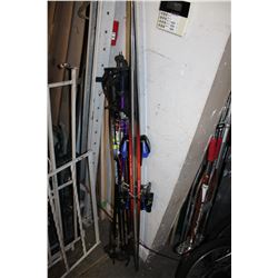 PAIR OF DYNASTAR SKIIS AND LOT OF SKI POLES