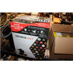 TWO KEURIG MACHINES AND CUPS