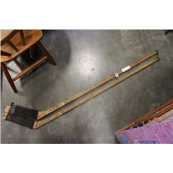 TWO VINTAGE CCM HOCKEY STICKS