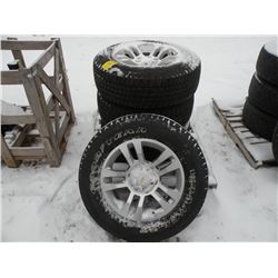 Qty 4 Goodyear Wrangler P265/65R18 tires on alum Chev rims