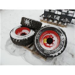 Qty 4 skidloader tires on Bobcat rims