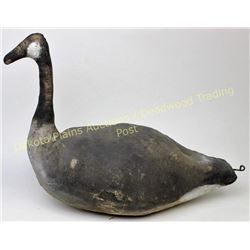 Early canvas goose decoy, unmarked 20" long, shows good overall condition, little damage to bottom. 