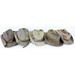 Collection of 5 Cowboy hats all show hard use and tons of character.  Est. 50-125