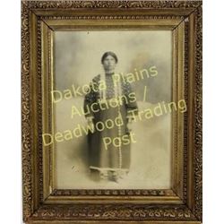 Original black and white photo 12"x9" Sioux Indian Woman in elk tooth dress, back of photo reads "Ft